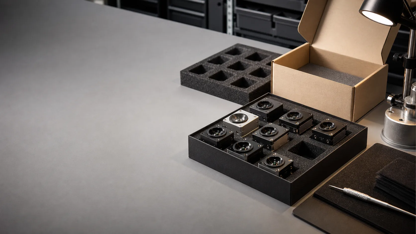 Custom camera modules prepared in a quality-controlled delivery station